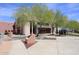 View of the Community Center, featuring a statue and well-maintained landscaping at 16920 E Monterey Dr, Fountain Hills, AZ 85268