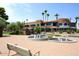 Commercial shopping center with fountains and shaded benches in an outdoor plaza at 16920 E Monterey Dr, Fountain Hills, AZ 85268