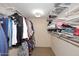 Organized walk-in closet with ample hanging space and shelving units for efficient storage at 16920 E Monterey Dr, Fountain Hills, AZ 85268