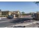 Community security gate with a guard house and black fence at 18250 N Cave Creek Rd # 164, Phoenix, AZ 85032