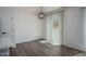 Bright dining area with wood floors, neutral walls and a modern chandelier at 18250 N Cave Creek Rd # 164, Phoenix, AZ 85032