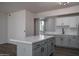 Well-designed kitchen with stainless steel appliances, a spacious island, and bright lighting at 18250 N Cave Creek Rd # 164, Phoenix, AZ 85032