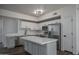 Beautiful kitchen featuring an island, stainless appliances, and plenty of cabinet space at 18250 N Cave Creek Rd # 164, Phoenix, AZ 85032