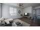 Inviting living room with modern furniture, a rug, and a ceiling fan at 18250 N Cave Creek Rd # 164, Phoenix, AZ 85032