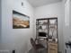 Cozy home office features a wood and metal shelving unit and modern desk at 18250 N Cave Creek Rd # 164, Phoenix, AZ 85032