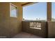 Outdoor patio space with a scenic view overlooking the nearby neighborhood and blue sky at 18250 N Cave Creek Rd # 164, Phoenix, AZ 85032