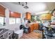 Bright kitchen with wood-look flooring, wood cabinets, and ample counter space for meal preparation at 18435 N 36Th Ave, Glendale, AZ 85308