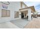 Exterior shot of home with patio featuring outdoor cooking area and basketball hoop at 23693 W La Vista Cir, Buckeye, AZ 85396