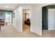 Neutral hallway featuring recessed lighting offering views to other rooms, including a bathroom at 23693 W La Vista Cir, Buckeye, AZ 85396