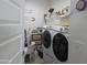 Organized laundry room featuring modern washer and dryer, storage shelves and decorative accents at 24986 N 172Nd Ln, Surprise, AZ 85387