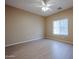 Bedroom with neutral walls, hardwood floors, a window, and ceiling fan at 2600 E Springfield Pl # 59, Chandler, AZ 85286