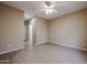 An inviting bedroom with light wood-look flooring and a ceiling fan at 2600 E Springfield Pl # 59, Chandler, AZ 85286