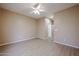 An inviting bedroom with light wood-look flooring and a ceiling fan at 2600 E Springfield Pl # 59, Chandler, AZ 85286