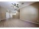 Open concept living room with neutral walls, hardwood style floors, and natural light at 2600 E Springfield Pl # 59, Chandler, AZ 85286