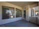 Covered patio offering a relaxed outdoor space with multiple windows and access door at 2600 E Springfield Pl # 59, Chandler, AZ 85286