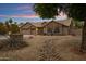 Well-maintained home with desert landscaping, a three-car garage, and a welcoming facade at 3060 W Ironwood Cir, Chandler, AZ 85226