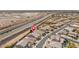 Overhead view of the property near a canal, surrounded by mature trees and residential streets at 3121 N Loma Vista Dr, Mesa, AZ 85213