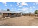 Large, flat backyard with a fence; the perfect space for outdoor activities at 345 N Madison St, Wickenburg, AZ 85390