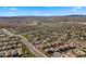 Wide aerial view displays a community of single Gathering homes amidst the natural desert environment at 3708 W Rushmore Dr, Anthem, AZ 85086