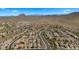 Panoramic aerial view of residential homes in desert community with mountain range backdrop at 3708 W Rushmore Dr, Anthem, AZ 85086