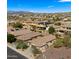 Desert neighborhood homes nestled in a community with distant mountain views and native trees at 3708 W Rushmore Dr, Anthem, AZ 85086