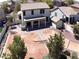 Aerial view of the backyard showing the outdoor kitchen and low maintenance landscaping at 40232 W Marion May Ln, Maricopa, AZ 85138