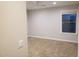 Bright bedroom with neutral walls and plush carpeting at 40232 W Marion May Ln, Maricopa, AZ 85138