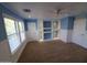 Large bedroom features custom shelves with accent lighting, carpet and neutral colored walls at 40232 W Marion May Ln, Maricopa, AZ 85138