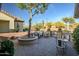 Charming private courtyard with stylish seating and desert landscaping at 41006 N Noble Hawk Way, Anthem, AZ 85086