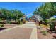 Adventure playground and splash pad featuring rail road crossing signs and brick pathway at 41006 N Noble Hawk Way, Anthem, AZ 85086