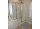 Bathroom showcasing walk-in shower with sliding door and tile floors at 4208 E Amarillo Dr, San Tan Valley, AZ 85140