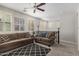 Upstairs living room features comfortable sofas and an open railing overlooking downstairs at 4281 E Mesquite St, Gilbert, AZ 85296