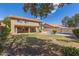 Expansive backyard oasis with a sparkling pool and covered patio perfect for entertaining at 4643 E Villa Maria Dr, Phoenix, AZ 85032