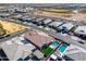 Elevated shot of neighborhood homes including the backyard pool, surrounded by an orderly housing development at 4834 S Meteor --, Mesa, AZ 85212