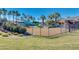 Community pool area featuring a slide, lighthouse, palm trees and picnic area at 4834 S Meteor --, Mesa, AZ 85212