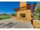 Exterior view of community fireplace with stone accents, covered pergola, and view of surrounding park area at 4834 S Meteor --, Mesa, AZ 85212