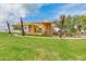 Open lawn in a community park featuring a modern architectural structure at 4834 S Meteor --, Mesa, AZ 85212