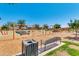 A colorful and fun playground with slides, swings, and climbing structures for children to enjoy outdoor play at 4834 S Meteor --, Mesa, AZ 85212