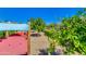 Colorful play structure surrounded by lush green landscaping, perfect for outdoor fun at 4834 S Meteor --, Mesa, AZ 85212