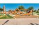 Vibrant playground featuring modern climbing structures and slides for children at 4834 S Meteor --, Mesa, AZ 85212