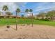 Inviting neighborhood playground featuring a classic swing set under sunny skies and lush landscaping at 4834 S Meteor --, Mesa, AZ 85212