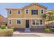 Two-story home with a combination of stucco and stone veneer, complemented by a well-maintained front yard and a paved walkway at 504 N Ranger Trl, Gilbert, AZ 85234