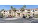 Complex with palm trees, circular driveway and meticulous landscaping at 5302 E Van Buren St # 2060, Phoenix, AZ 85008