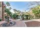 Picturesque fountain, landscaping, and architecture enhance this charming outdoor space at 5302 E Van Buren St # 2060, Phoenix, AZ 85008