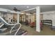 Spacious fitness center with modern equipment and ample room for various workout activities at 5302 E Van Buren St # 2060, Phoenix, AZ 85008