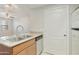 Well-lit kitchen featuring stainless steel appliances, double sink, light wood cabinets, and a modern faucet at 5302 E Van Buren St # 2060, Phoenix, AZ 85008