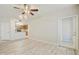 Open-concept living room with vinyl plank flooring and a view to the kitchen at 5302 E Van Buren St # 2060, Phoenix, AZ 85008