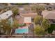 Aerial view of the backyard, featuring a pool and solar panels at 5507 N Calle Del Santo --, Phoenix, AZ 85018