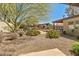 A beautiful backyard with desert landscaping and mature trees at 5507 N Calle Del Santo --, Phoenix, AZ 85018