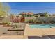 Inviting backyard oasis with a sparkling pool, manicured desert landscaping, and mountain views at 5507 N Calle Del Santo --, Phoenix, AZ 85018